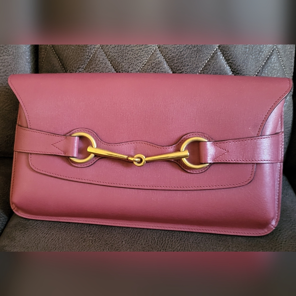 Gucci Pink Clutch with Gold Hardware. Excellent Used Condition.
